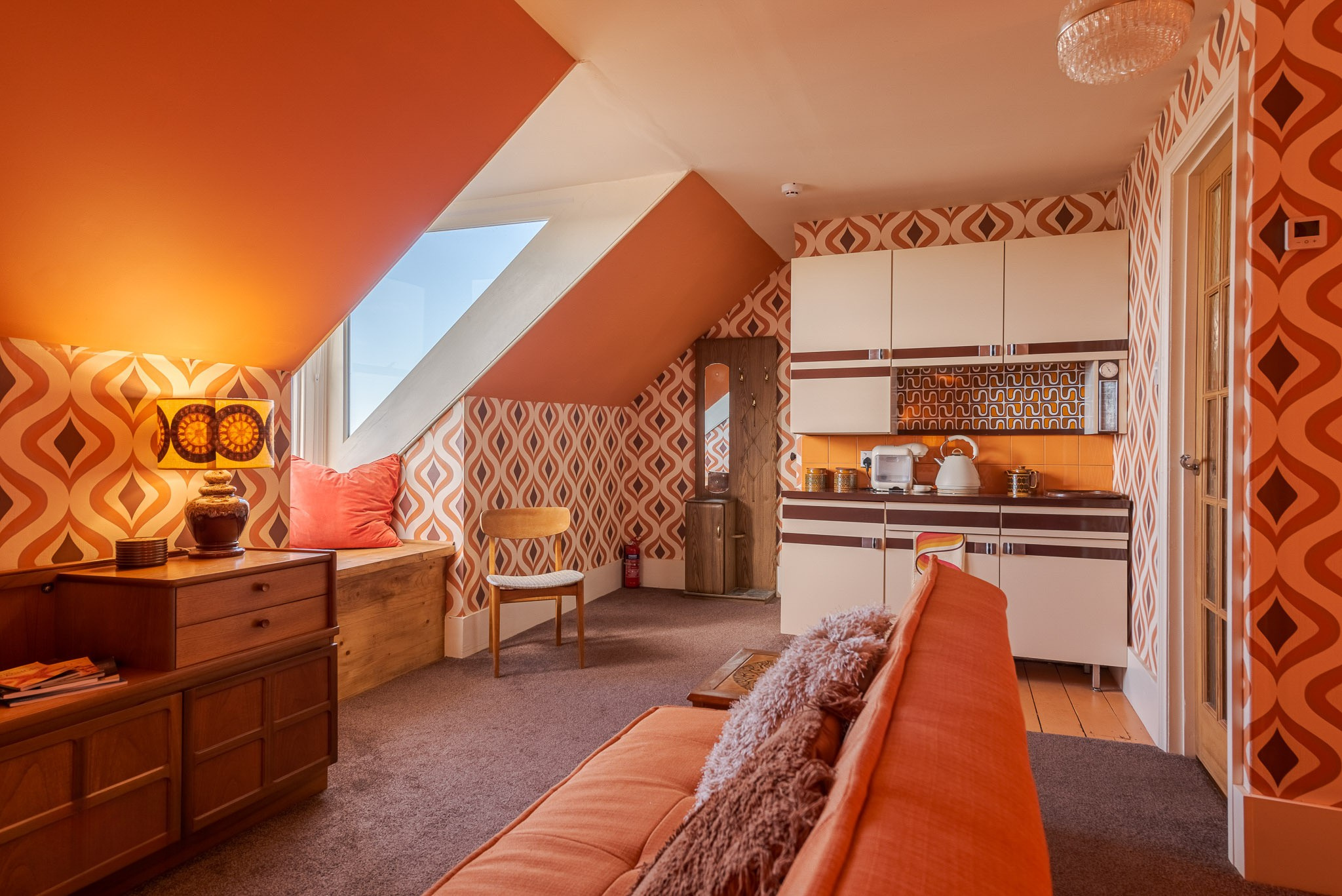 1970s retro loft apartment with skylight, vintage sofa and original kitchen at Margate Delight photography location Margate