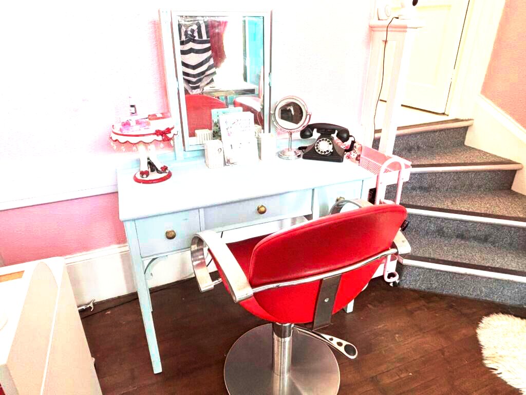 Styled vintage dressing table with props and pink trolley at Le Keux Vintage, Margate
