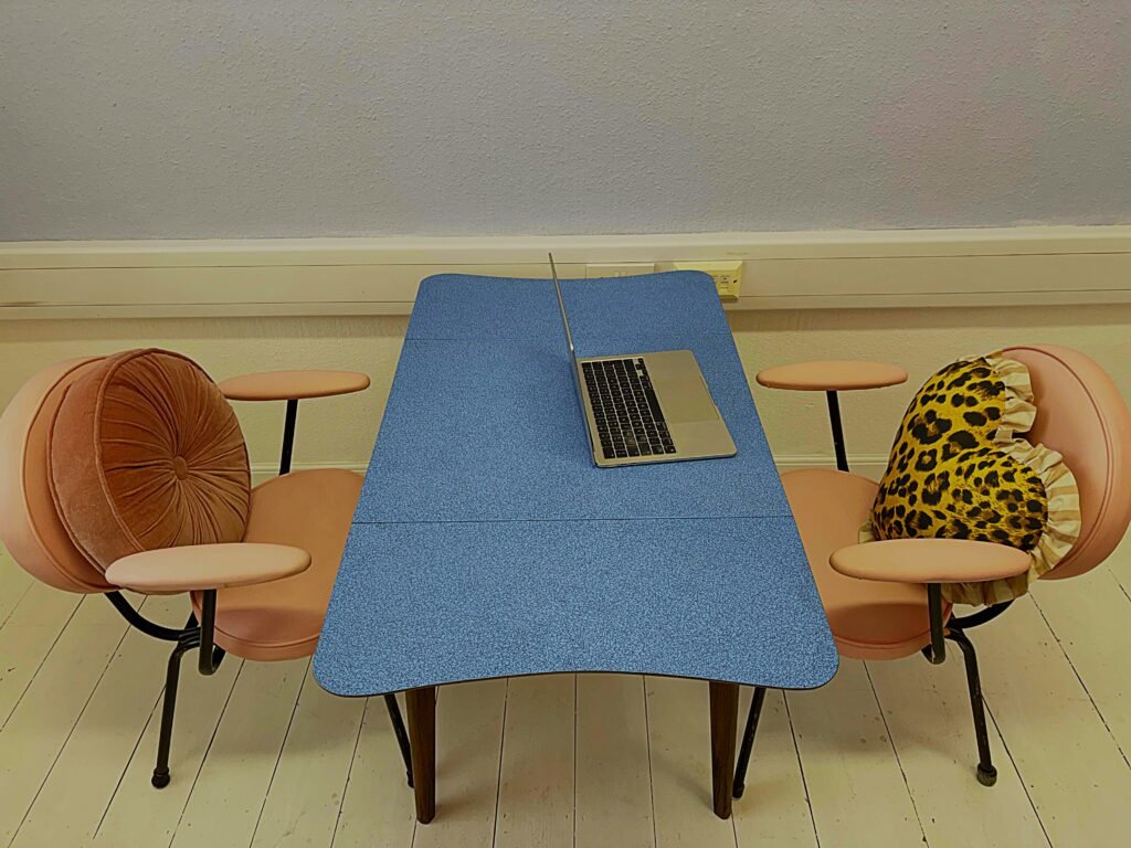 private meeting room at Le Keux Vintage Margate with retro desk and pastel walls, bookable as a quiet podcast space